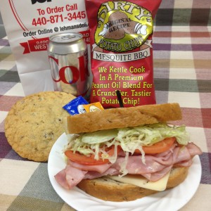 Ham and Swiss on Rye, BBQ Chips, Chocolate Cookie and Can of Diet Coke