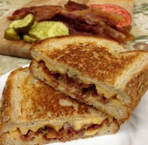 Grilled Cheese with Bacon You could think of this as the grown-up version because bacon, just like mom, makes everything better. Our bacon is thick sliced crispy perfection.